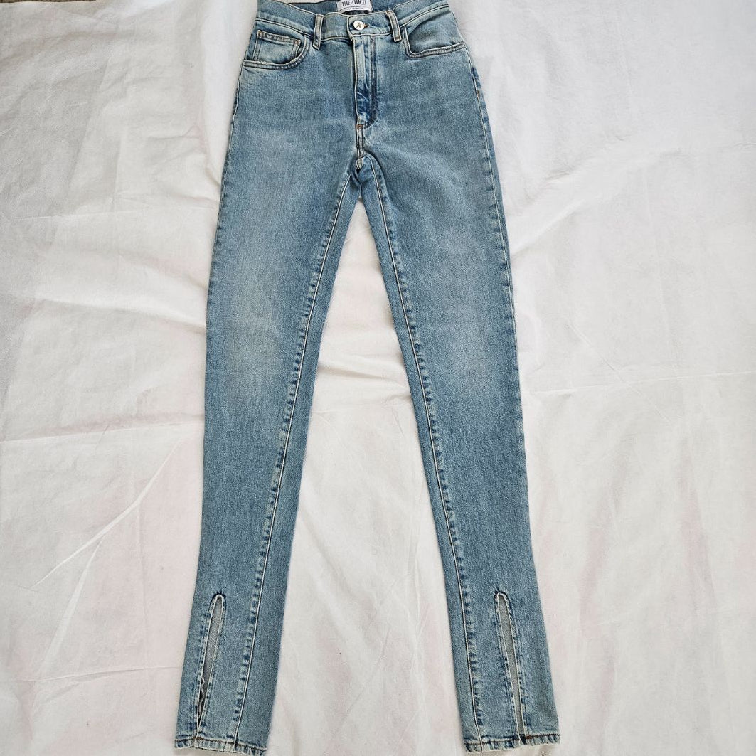 Attico blue denim jeans with slit