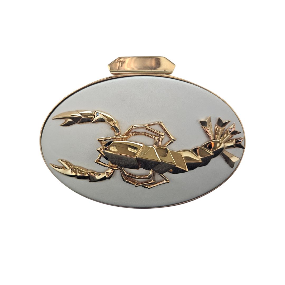 Giuseppe Zanotti white clutch with gold scorpion