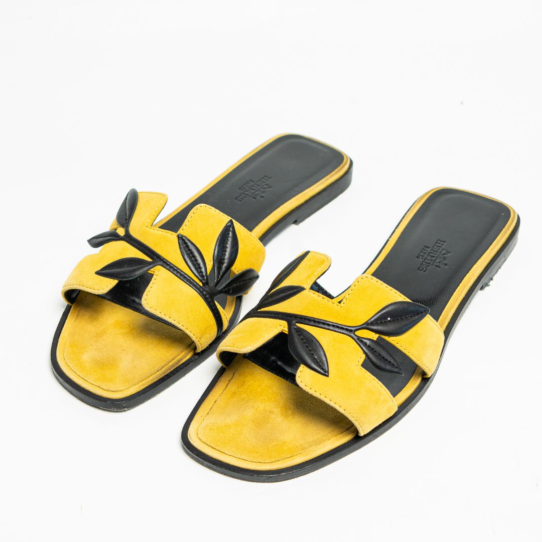 Hermès Yellow Limited Edition Yellow suede and black leather sandals, 38