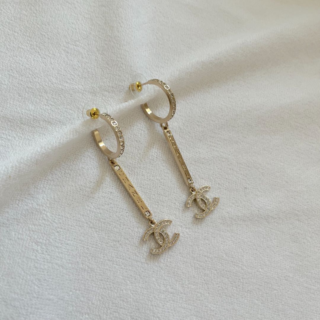 Chane light gold-tone metal drop earring