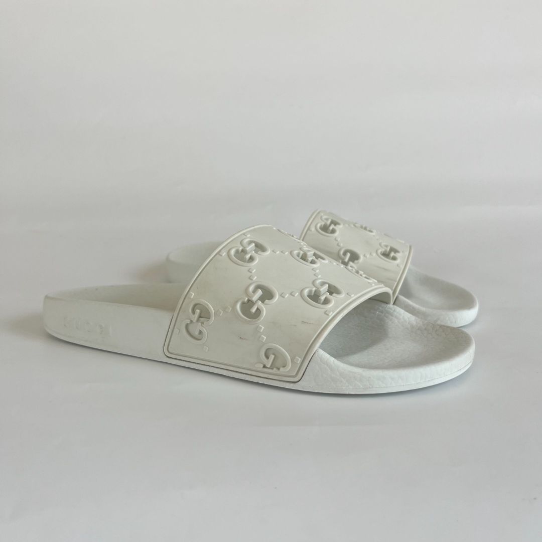 Gucci White GG Laser Cut Rubber Slides, 39