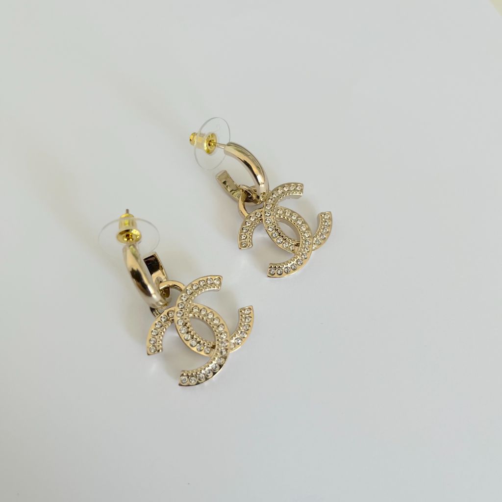 Chanel gold hook earrings with crystal embellished CC