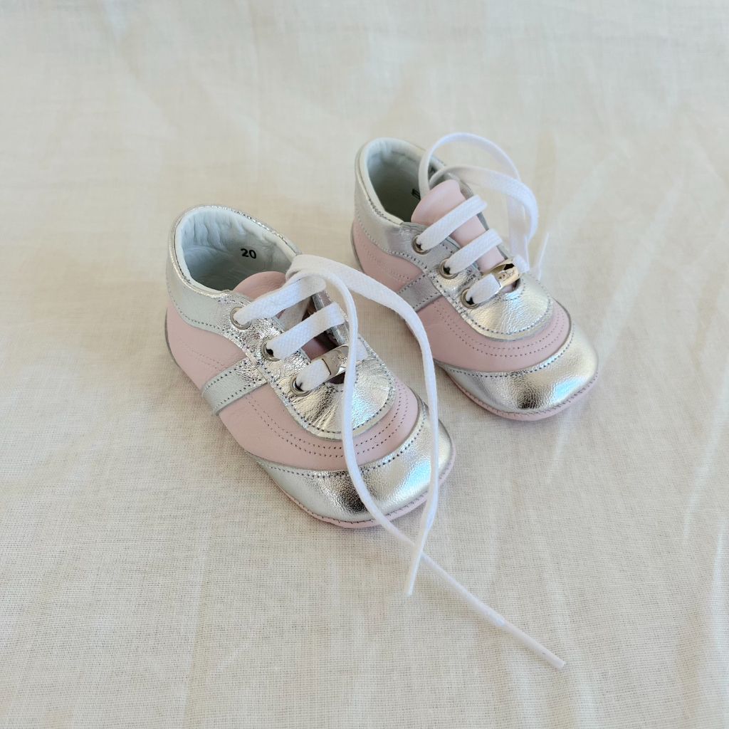 Dior baby shoes in pink and metallic leather, white laces