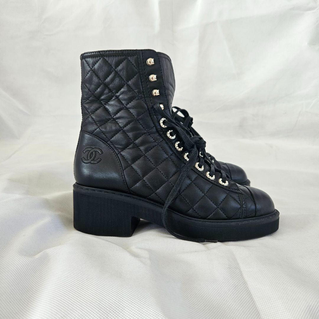 Chanel black leather quilted combat lace up boots, 37.5