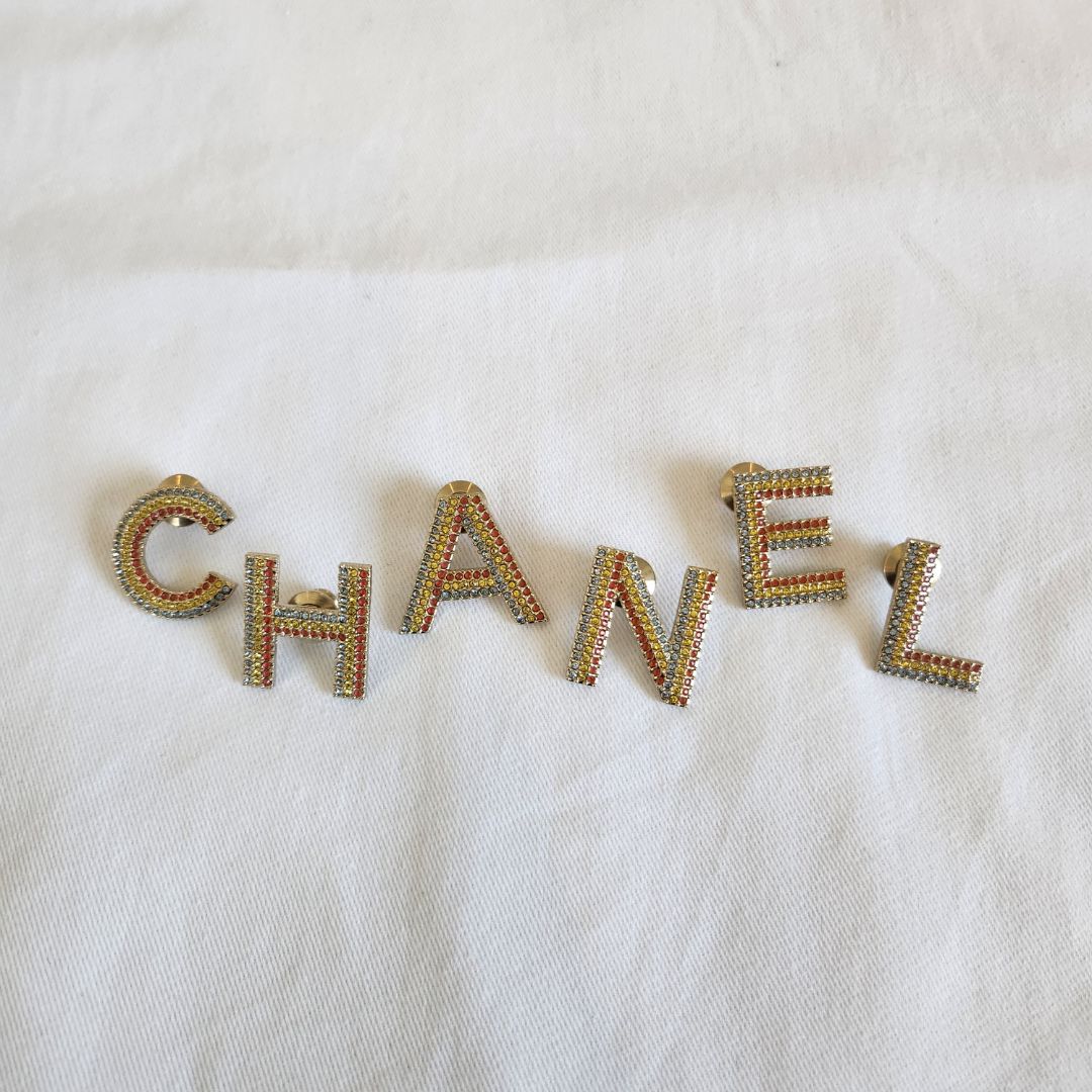 CHANEL crystal embellished Letter brooch