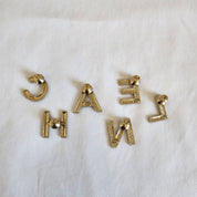 CHANEL crystal embellished Letter brooch