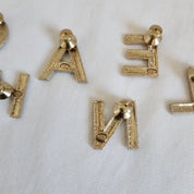 CHANEL crystal embellished Letter brooch
