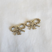Chanel twisted metal bow earrings From 2023-24FW