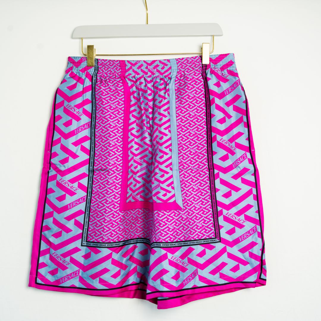 Versace La Greca panelled-print Bermuda shorts