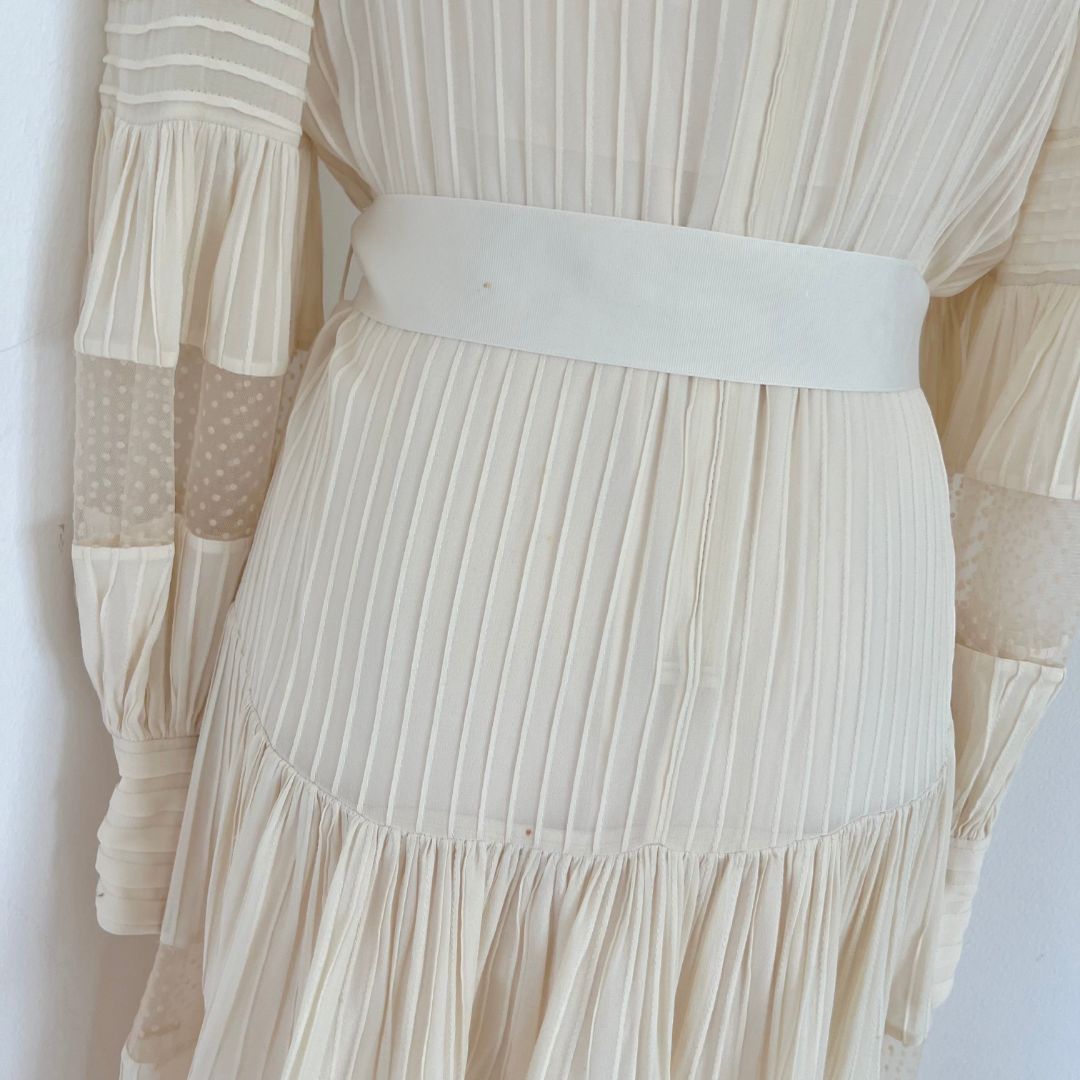 zimmermann spliced mesh midi dress Swept up in ethereal light. The Solstice Tiered Midi Dress and Aster Spliced Tri Bikini.
