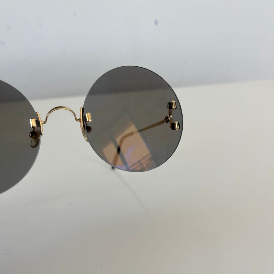 Cartier Madison Round Rimless Black Sunglasses