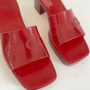 Gucci red rubber heeled logo embossed sandals, 39