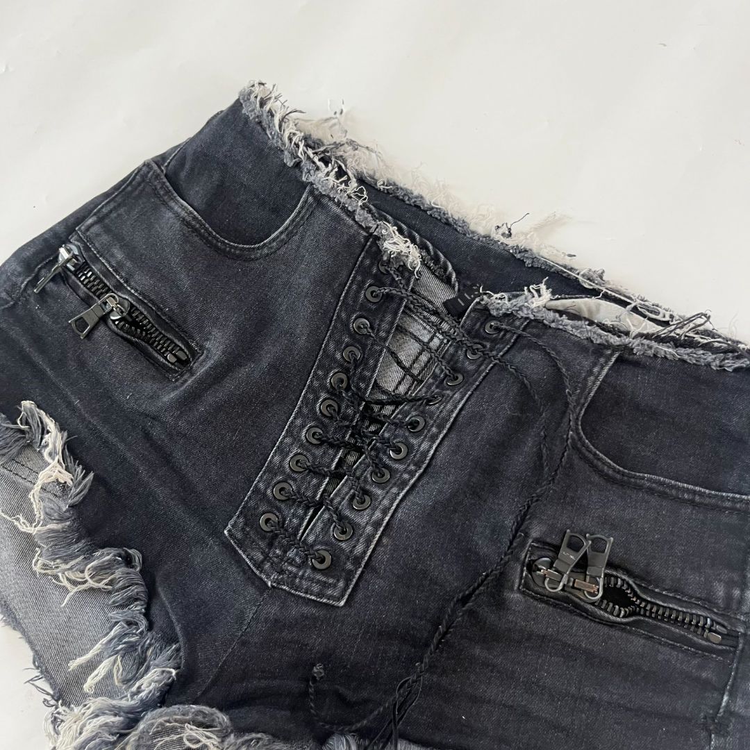 Unravel black distressed lace up shorts