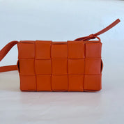Bottega Veneta Orange Intrecciato Leather Cassette Shoulder Bag