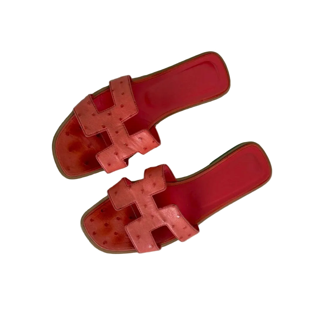 Hermès  orange ostrich sandal flats, size 38.5
