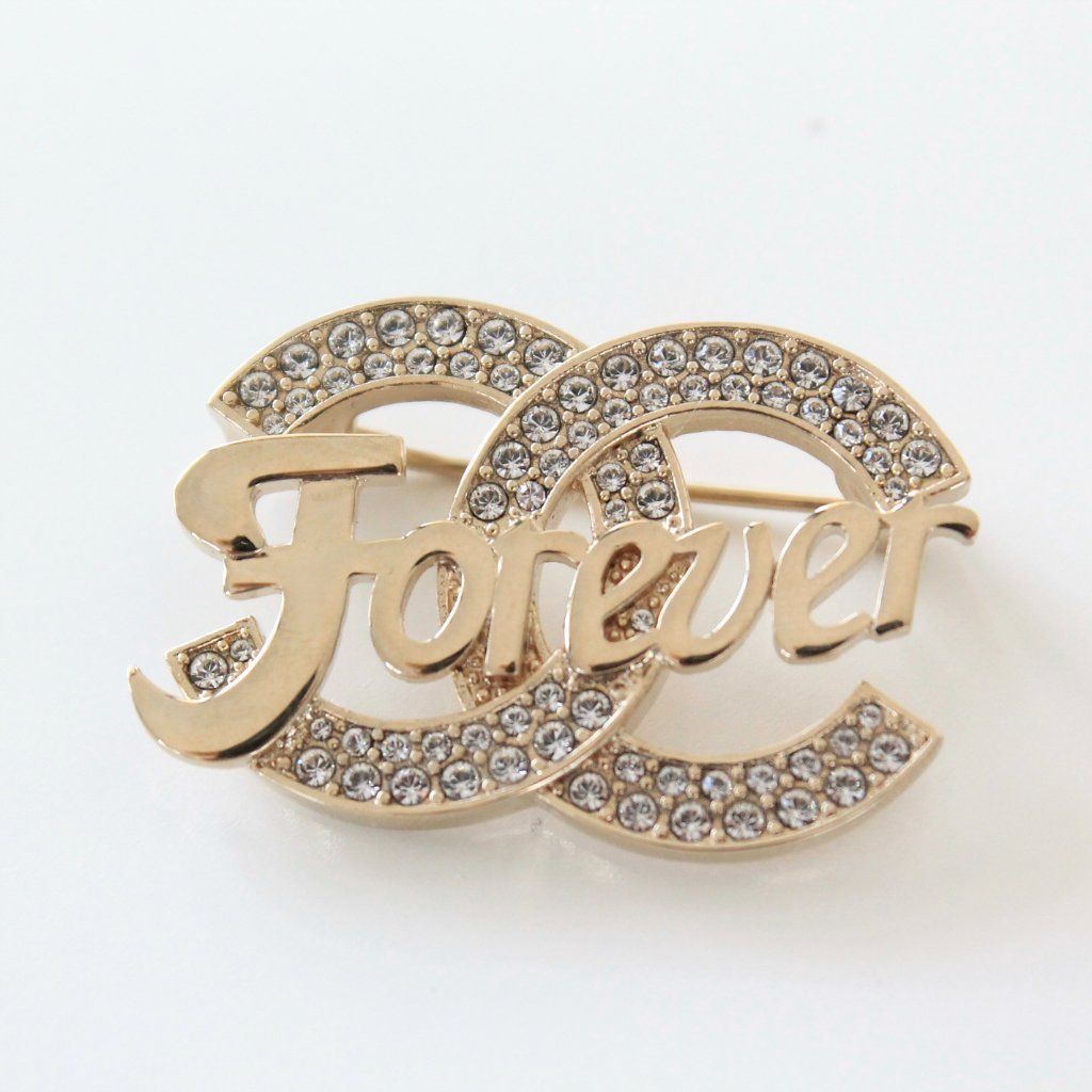 Chanel gold-tone metal small ‘forever’ brooch