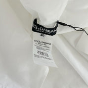 Dolce & Gabbana white cotton short with ruffle detail on collar and cuffs