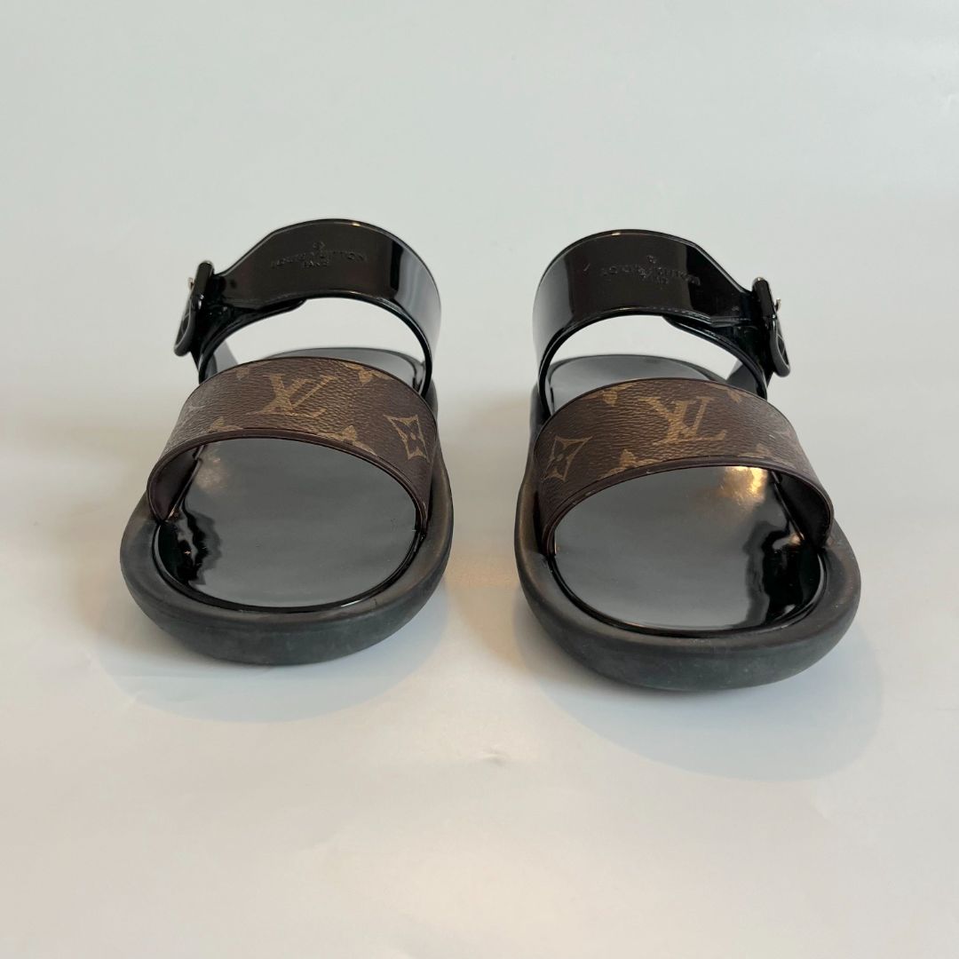 Louis Vuitton, Shoes, Mint Condition Authentic Louis Vuitton Monogram  Sunbath Flat Mule Sandals