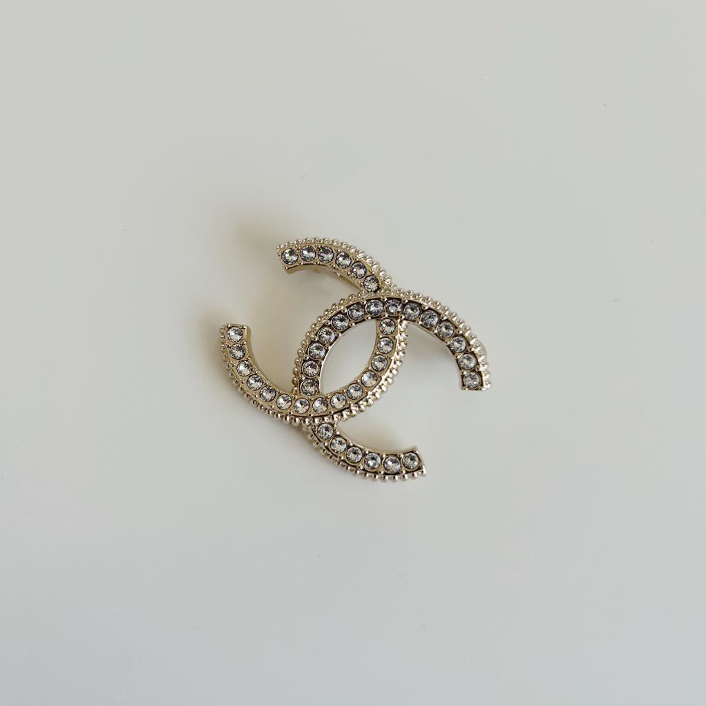 Chanel crystal encrusted light gold tone hardware brooch