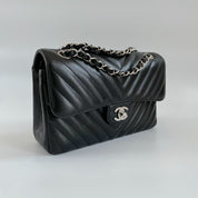 Chanel black chevron quilted leather double flap bag