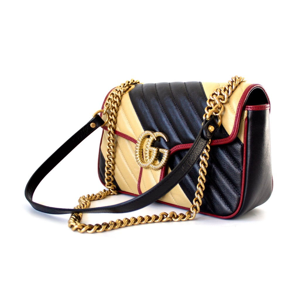 Gucci GG Marmont Small shoulder bag in black and beige quilted leather and red piping