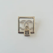 Chanel square gold crystal embellished brooch with lock cc pendant