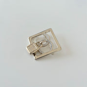Chanel square gold crystal embellished brooch with lock cc pendant