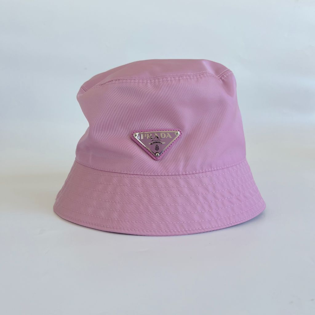 Prada pink re-nylon bucket hat with logo plaque - BOPF | Business