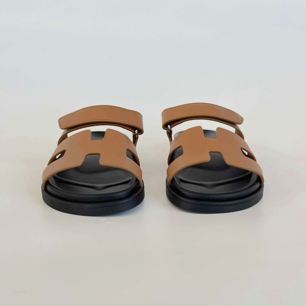 Hermès Chypre caramel and black leather sandals, 37.5