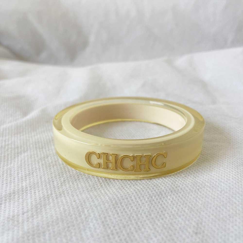CH Carolina Herrera White Resin Bangle Bracelet - BOPF | Business of Preloved Fashion