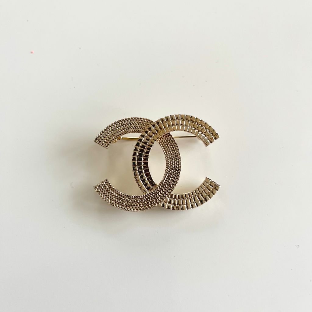Chanel light gold-tone textured brooch - BOPF | Business of Preloved Fashion