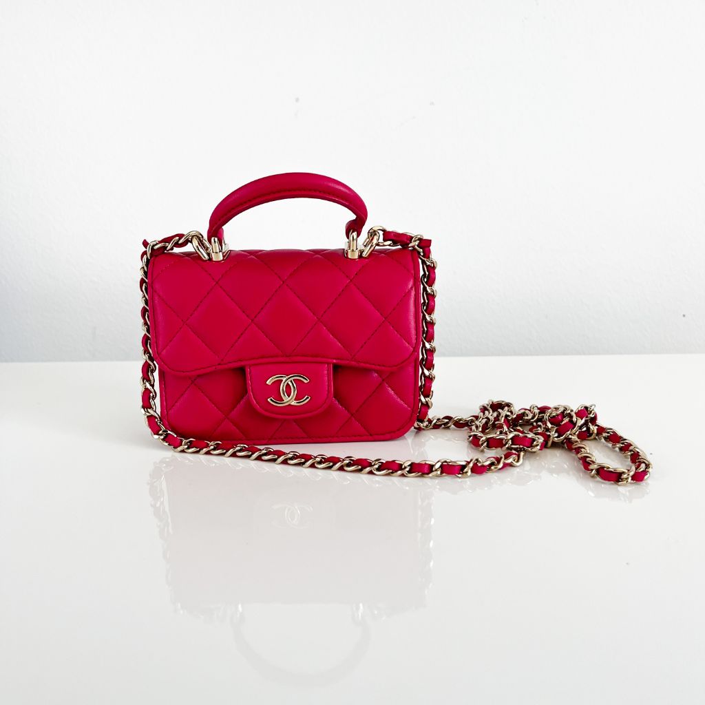 Chanel pink quilted lambskin top handle micro top handle flap bag