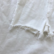 Stella McCartney white denim shorts with frayed edges