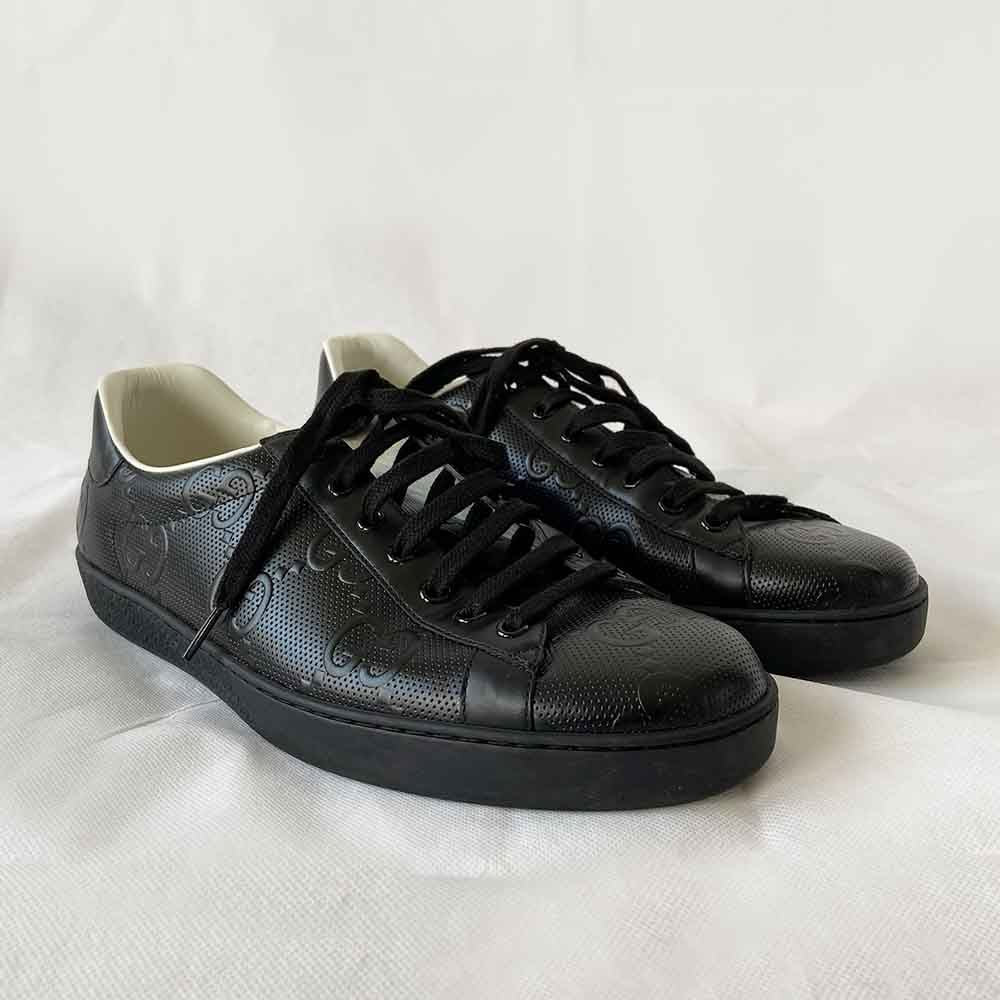 Men's Ace GG embossed sneaker in black leather