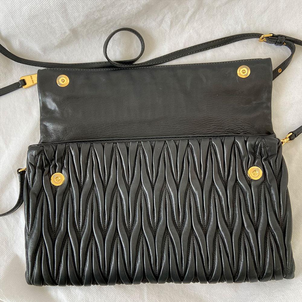 Miu Miu black leather matelasse fold over clutch bag - BOPF | Business of Preloved Fashion