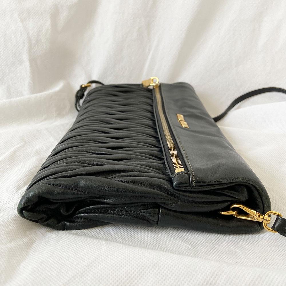 Miu Miu black leather matelasse fold over clutch bag - BOPF | Business of Preloved Fashion