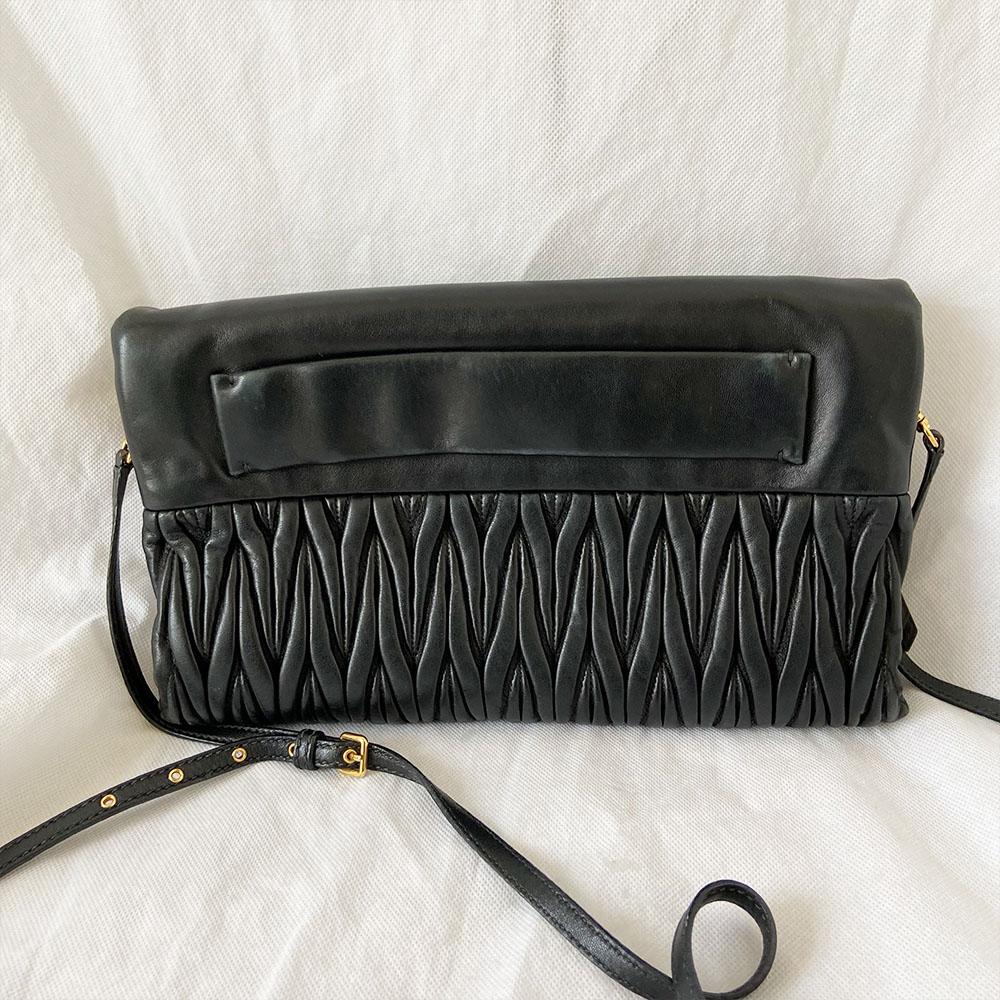 Miu Miu black leather matelasse fold over clutch bag - BOPF | Business of Preloved Fashion
