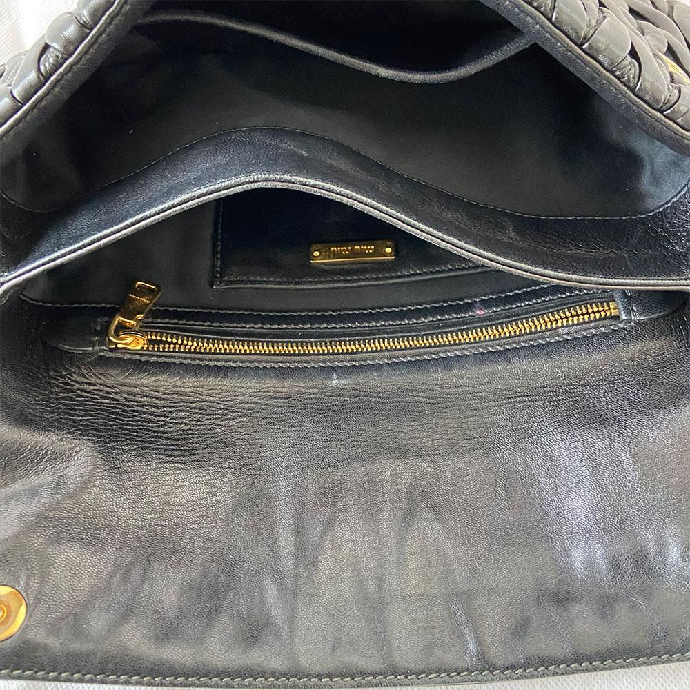 Miu Miu black leather matelasse fold over clutch bag - BOPF | Business of Preloved Fashion