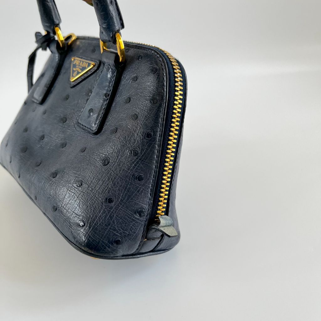 Prada navy blue ostrich leather micro top handle bag - BOPF | Business of Preloved Fashion