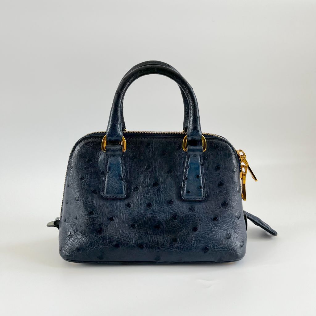 Prada navy blue ostrich leather micro top handle bag - BOPF | Business of Preloved Fashion
