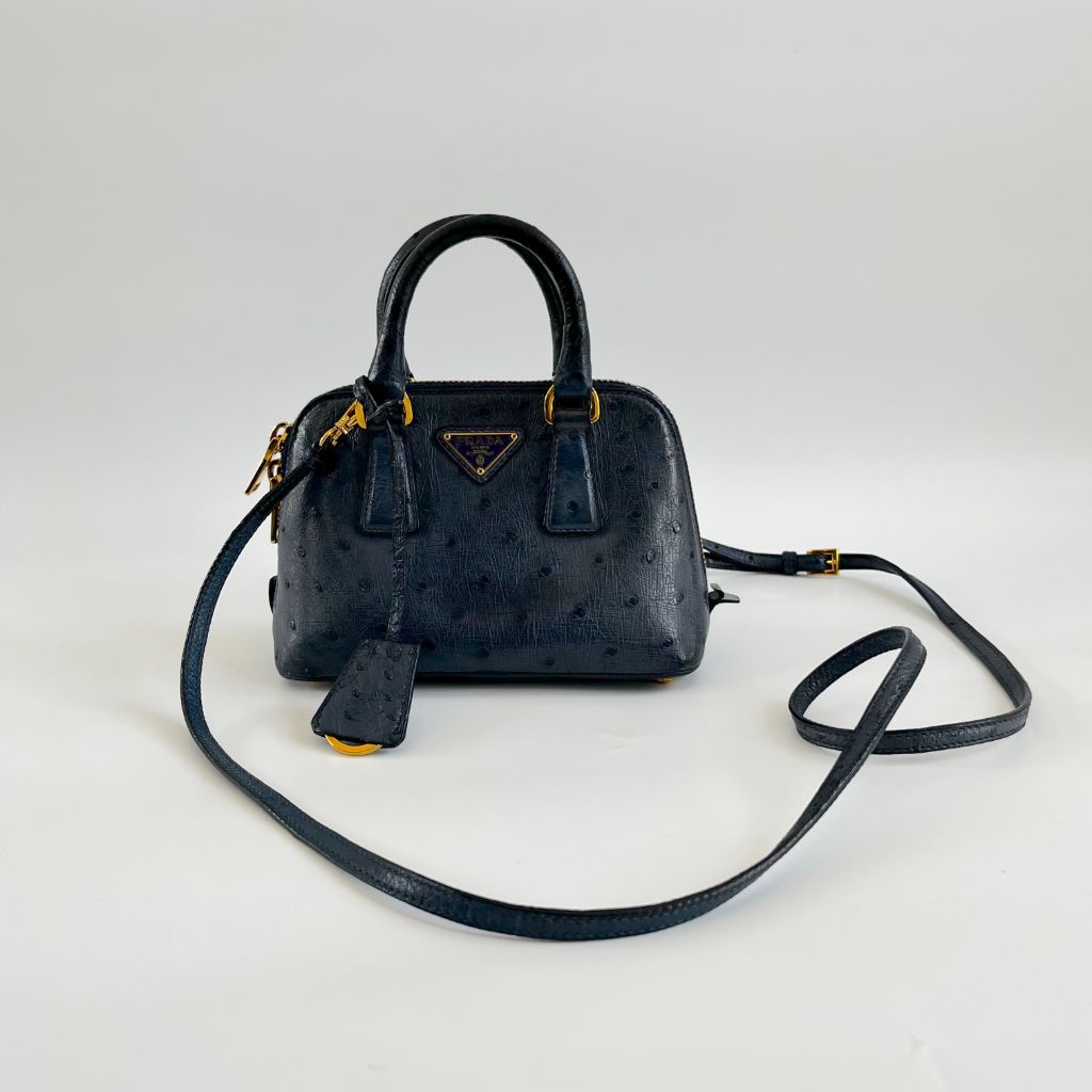 Prada navy blue ostrich leather micro top handle bag - BOPF | Business of Preloved Fashion