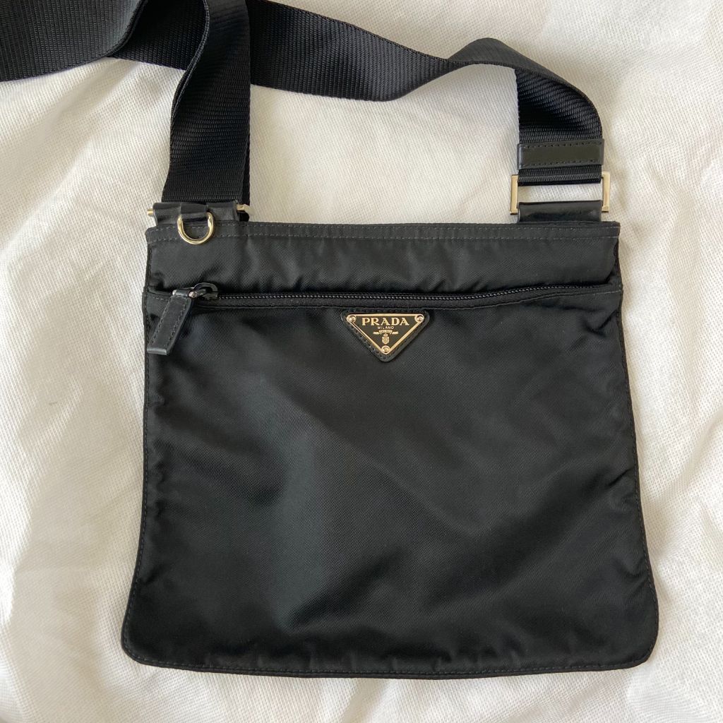 PRADA: clutch bag in nylon and saffiano leather with triangular logo -  Black