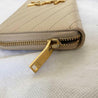 Saint Laurent nude Monogram quilted leather zip-around wallet - BOPF | Business of Preloved Fashion